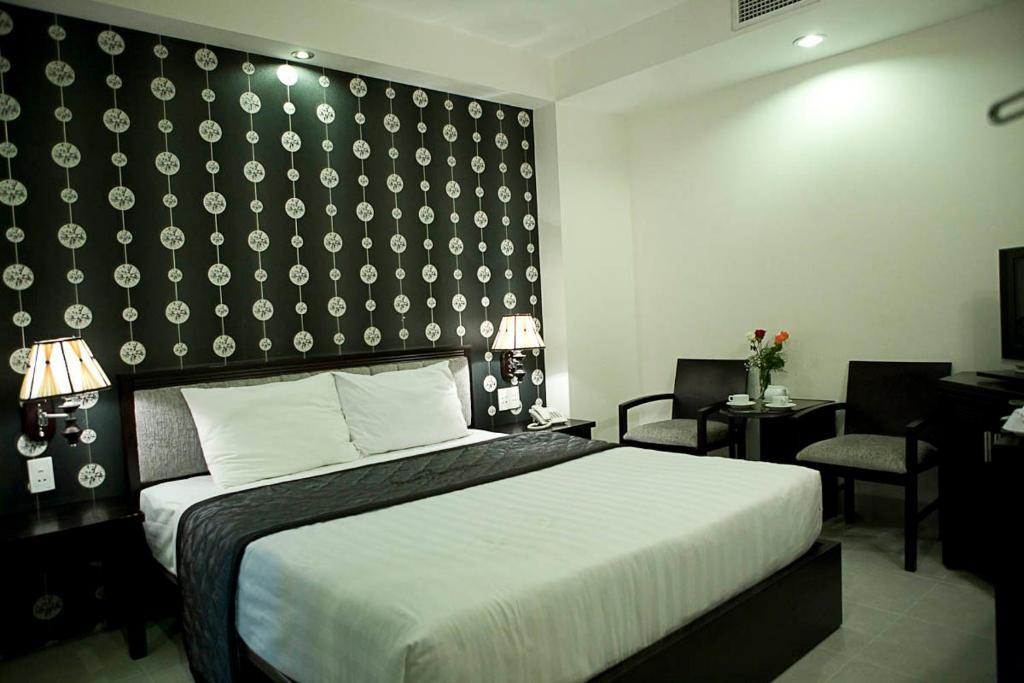 Hoang Vinh Hotel Ho Chi Minh-stad Kamer foto
